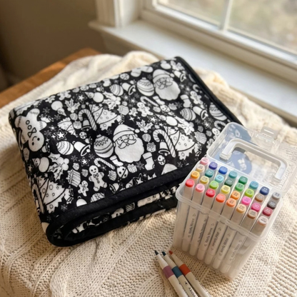 Doodle Snug blanket folded with markers