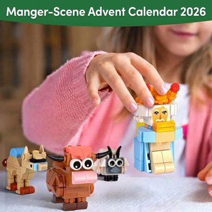 Child building nativity figures from the advent calendar