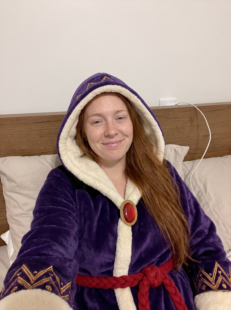 Customer wearing the Villain Snugs heated robe